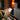 a person holding a phone with the revotion app running